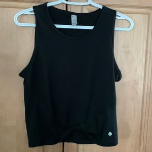 Black sleeveless versatile top with knotted waist detail
